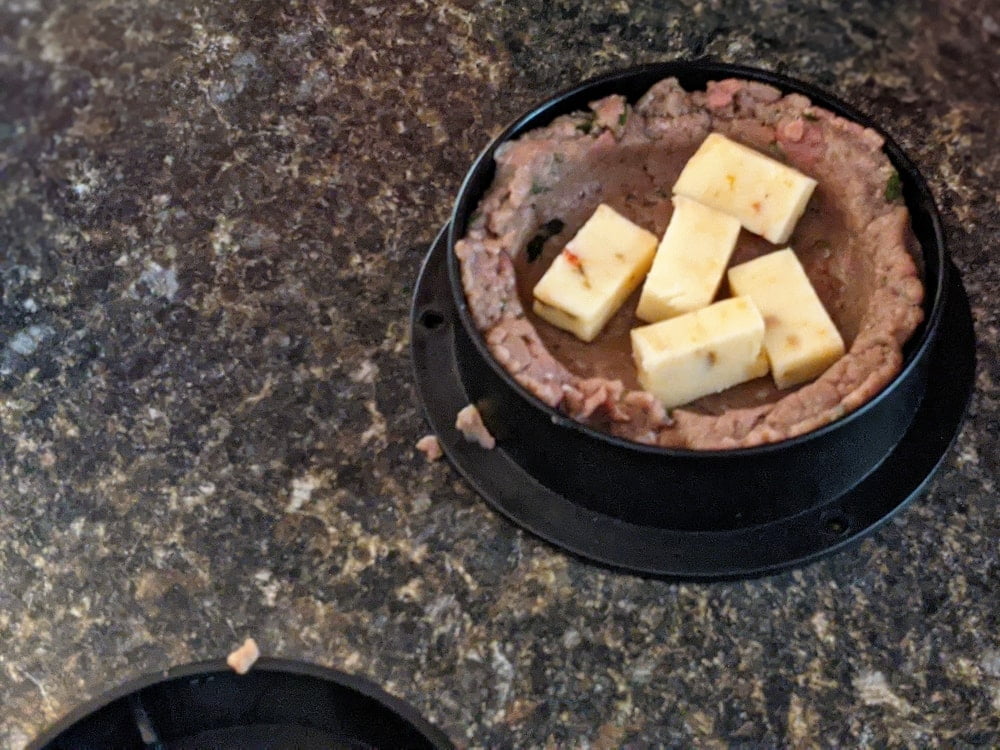 Adding cheese to stuffed burger
