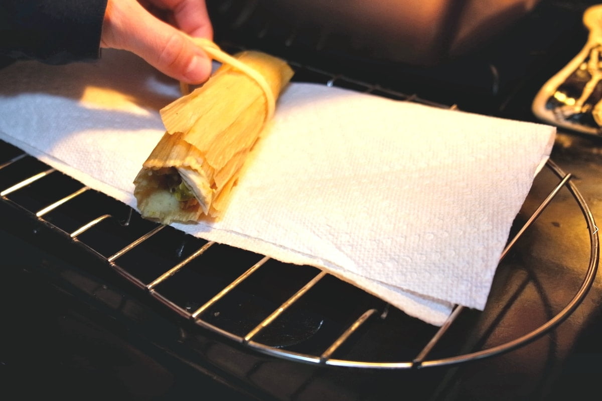 unrolling steamed tamale