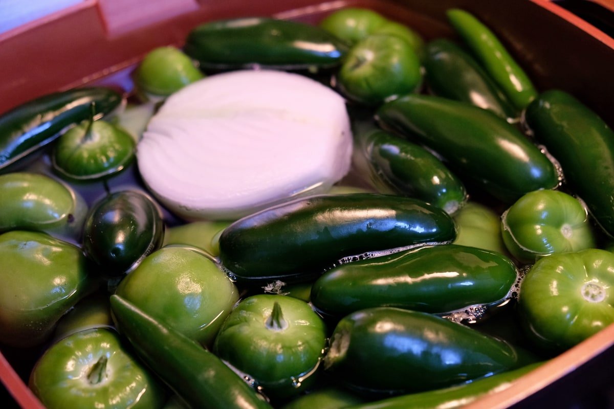 Boiling chile ingredients for tamales